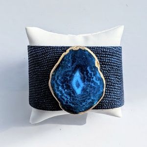 Embossed hide cuff